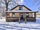 Charming home featuring a covered front porch and classic design details at 210 S West St, Paragon, IN 46166