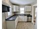 Functional kitchen equipped with white cabinets and stainless steel appliances at 210 S West St, Paragon, IN 46166