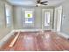Hardwood floors in a gray-painted living room with natural light at 210 S West St, Paragon, IN 46166