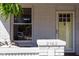 Close-up of the home's exterior, showcasing the front door and house number at 2162 Ringgold Ave, Indianapolis, IN 46203