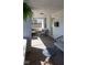 Inviting front porch featuring stylish seating, a welcome mat, and neutral paint at 2162 Ringgold Ave, Indianapolis, IN 46203