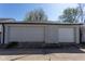 Two-car detached garage with white garage doors and brick details at 2162 Ringgold Ave, Indianapolis, IN 46203