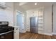 Well-lit kitchen with stainless steel appliances, ample cabinet space, and modern fixtures at 2162 Ringgold Ave, Indianapolis, IN 46203