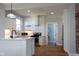 Bright, open kitchen with stainless steel appliances, subway tile, and modern design elements at 2162 Ringgold Ave, Indianapolis, IN 46203