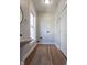 Clean laundry room with modern flooring, bright window, and essential hookups at 2162 Ringgold Ave, Indianapolis, IN 46203