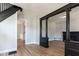 Bright and open living space featuring classic trim and a view into the updated kitchen at 2162 Ringgold Ave, Indianapolis, IN 46203