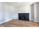 Cozy living room featuring a classic stone fireplace and neutral decor at 2162 Ringgold Ave, Indianapolis, IN 46203