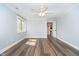 Bedroom featuring hardwood floors and natural light at 219 Buckingham Dr, Indianapolis, IN 46208