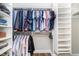 Organized walk-in closet with shelving and hanging rods at 219 Buckingham Dr, Indianapolis, IN 46208