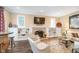 Cozy living room featuring a fireplace, built-in shelving, and comfortable seating at 219 Buckingham Dr, Indianapolis, IN 46208