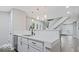 Bright kitchen features white cabinets, quartz countertops, subway tile backsplash and stainless steel appliances at 2257 E Brookside Ave, Indianapolis, IN 46218