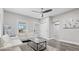 Comfortable living room with a ceiling fan, natural light, and stylish decor at 2257 E Brookside Ave, Indianapolis, IN 46218