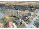 A scenic aerial view highlights a charming neighborhood with well-maintained homes, perfect for comfortable living at 2487 Wayward Wind Dr, Indianapolis, IN 46239
