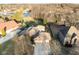 Aerial view of home with pond access, highlighting its prime real estate location and natural surroundings at 2487 Wayward Wind Dr, Indianapolis, IN 46239