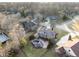 An aerial view showcases a lovely home with an inviting backyard pool, perfect for relaxation and outdoor enjoyment at 2487 Wayward Wind Dr, Indianapolis, IN 46239