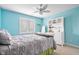 Cozy bedroom with a window and dresser, creating a bright and inviting space at 2487 Wayward Wind Dr, Indianapolis, IN 46239
