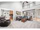 Expansive living room with a view into the kitchen and dining area, featuring high ceilings at 2487 Wayward Wind Dr, Indianapolis, IN 46239