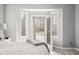 Bright bedroom features a glass door to the backyard and neutral decor at 2487 Wayward Wind Dr, Indianapolis, IN 46239