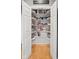 Well-organized pantry with multiple shelves filled with a variety of food items and kitchen supplies at 2487 Wayward Wind Dr, Indianapolis, IN 46239