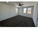 Spacious bedroom with neutral walls, plush carpet, and recessed lighting at 2819 Walker Ave, Indianapolis, IN 46203