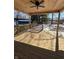 Covered outdoor wooden deck and ceiling fan at 2819 Walker Ave, Indianapolis, IN 46203