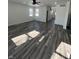 Bright, open living room featuring hardwood floors and large windows providing ample natural light at 2819 Walker Ave, Indianapolis, IN 46203