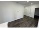 An open living room with hardwood floors and neutrally painted walls at 2819 Walker Ave, Indianapolis, IN 46203
