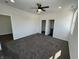 Large main bedroom with plush carpet and ensuite bathroom at 2819 Walker Ave, Indianapolis, IN 46203