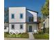Modern two-story home with white siding, black trim, and small balcony at 3238 Guilford Ave, Indianapolis, IN 46205