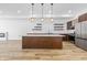 Modern kitchen with stainless steel appliances and quartz countertops at 3238 Guilford Ave, Indianapolis, IN 46205
