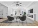 Bright living room with modern furniture, fireplace, and lots of natural light at 3238 Guilford Ave, Indianapolis, IN 46205