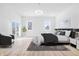 Bright main bedroom with natural light, plush furnishings, and backyard views at 3238 Guilford Ave, Indianapolis, IN 46205