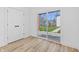 Bright room featuring sliding glass doors with backyard views, plus double door closet at 3238 Guilford Ave, Indianapolis, IN 46205