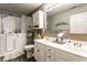 Well-appointed bathroom with double vanity, walk-in shower, and modern fixtures at 4033 Oak Trail Dr, Indianapolis, IN 46237