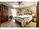 Comfortable carpeted bedroom with ceiling fan and natural light at 4033 Oak Trail Dr, Indianapolis, IN 46237