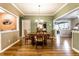 Inviting dining room with modern chandelier and hardwood flooring at 4033 Oak Trail Dr, Indianapolis, IN 46237