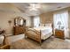 Serene main bedroom featuring neutral decor, a ceiling fan, and a spacious layout at 4033 Oak Trail Dr, Indianapolis, IN 46237