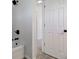 Bright bathroom featuring a shower and tub combination with matte black fixtures at 4139 N Grand Ave, Indianapolis, IN 46226