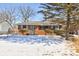 Charming brick home with a well-maintained front yard and winter landscaping at 4139 N Grand Ave, Indianapolis, IN 46226