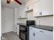 Kitchen with white cabinetry, dark countertop appliances and providing ample room for cooking and food preparation at 4139 N Grand Ave, Indianapolis, IN 46226