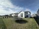 Spacious backyard with trampoline and black iron fence, perfect for outdoor entertaining and recreation at 4187 Risen Star Way, Bargersville, IN 46106