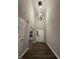 Grand foyer featuring soaring ceilings, hardwood floors, and a stunning modern chandelier at 4187 Risen Star Way, Bargersville, IN 46106