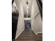 Inviting foyer boasts hardwood floors, contemporary lighting, and a view to the upper level at 4187 Risen Star Way, Bargersville, IN 46106