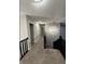 Hallway with carpet and black banister at 4187 Risen Star Way, Bargersville, IN 46106