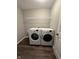 Well-equipped laundry room with modern washer and dryer, plus convenient shelving at 4187 Risen Star Way, Bargersville, IN 46106