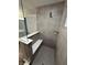 Modern tiled shower with a built-in bench and glass partition for a luxurious experience at 4187 Risen Star Way, Bargersville, IN 46106