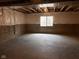 Bright basement featuring concrete foundation, plastic covered insulation and a window providing natural light at 4345 Indigo Walk Ln, Indianapolis, IN 46239