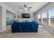 Cozy living room with vaulted ceilings, a large window, and a comfortable blue sofa at 4345 Indigo Walk Ln, Indianapolis, IN 46239