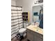 Standard bathroom with a neutral color scheme, a toilet, shower with curtain, and a vanity with mirror at 520 Gatewood Dr, Greenwood, IN 46143
