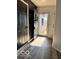 Inviting entryway with stylish flooring, modern doors, and plenty of natural light creating a warm and welcoming atmosphere at 520 Gatewood Dr, Greenwood, IN 46143